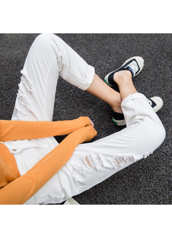2021 summer new perforated jeans women's Capris Korean fashion BF loose and Slim small foot 9-point Harem Pants
