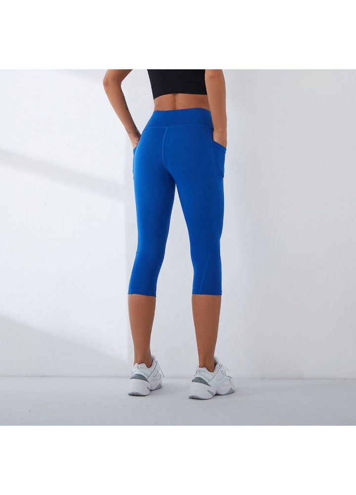 2021 European and American new yoga pants women's cross border slim high waist fitness pants running sports pants two side pocket Capris