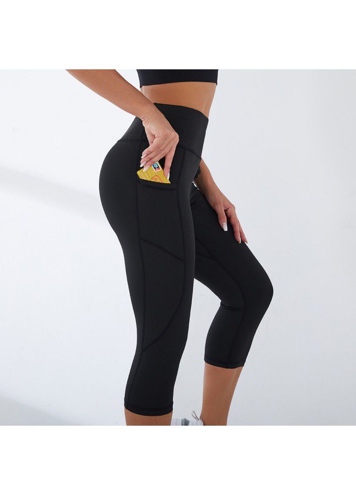Cross border fitness pants quick sell Capris side pocket high waist hip sexy Leggings European and American Yoga Pants female