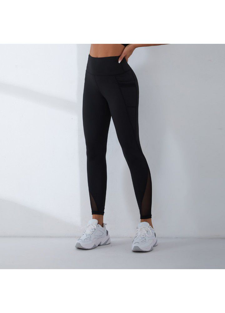 2021 European and American new yoga pants women's cross border slim high waist fitness pants running sports pants two side pocket Capris