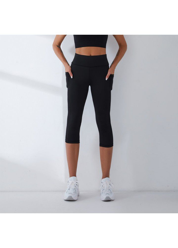 2021 new yoga pants cross border training high stretch fitness foreign trade pocket Capris European and American women's sports pants