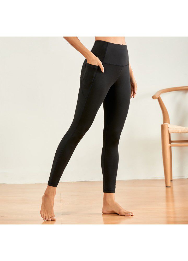 2021 Europe and America autumn and winter new yoga pants women's slim high waist fitness pants running sports pants two side pocket Capris