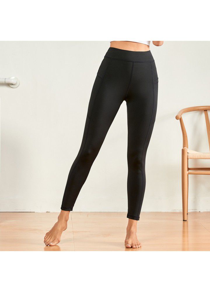 European and American Yoga Pants popular high waist Leggings outdoor running fitness pants solid color mobile phone pocket tights