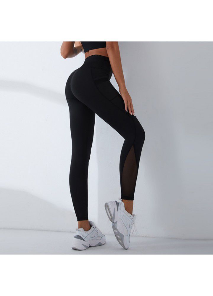 2021 European and American new yoga pants women's cross border slim high waist fitness pants running sports pants two side pocket Capris