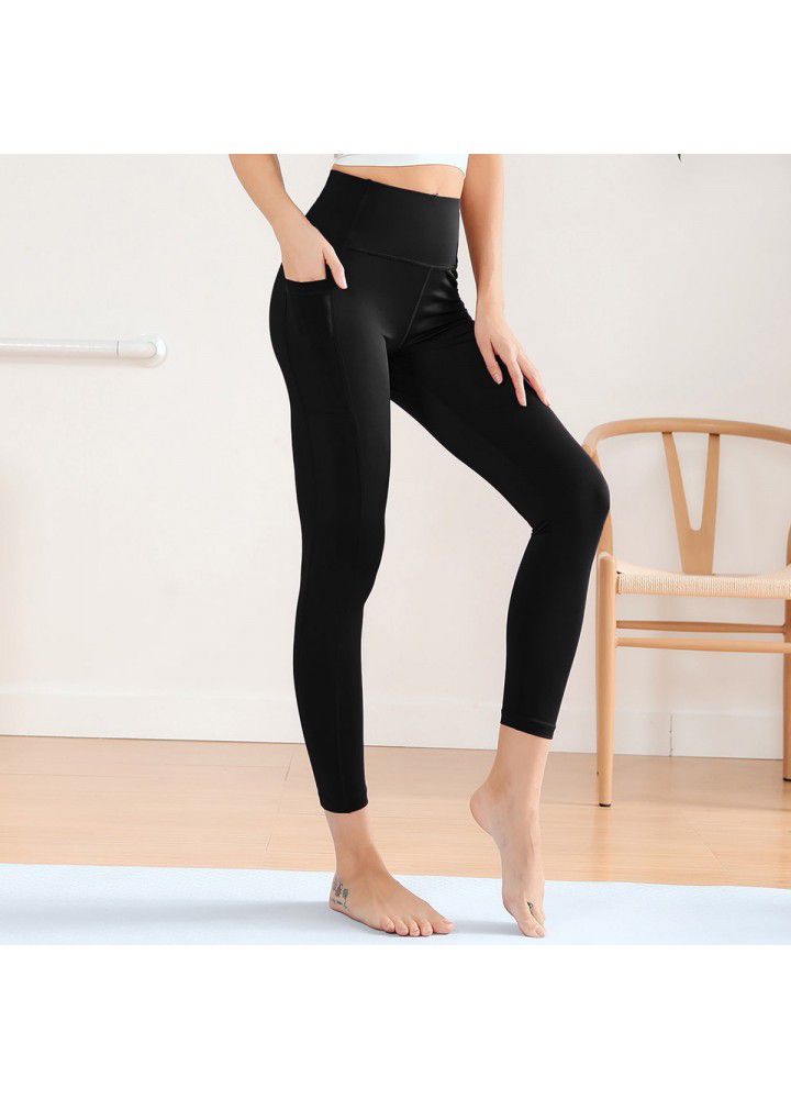 Cross border new style Pocket Yoga Pants women's European and American foreign trade women's tight sports pants high waist solid color fitness Capris