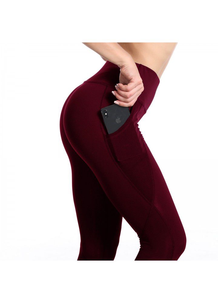 Cross border women's Yoga Pants European and American mesh pocket running tights high waist elastic quick drying sports fitness pants
