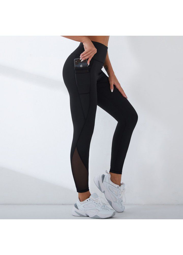 2021 European and American new yoga pants women's cross border slim high waist fitness pants running sports pants two side pocket Capris