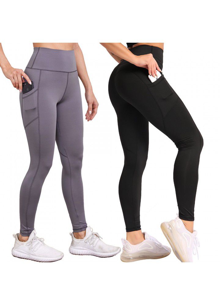 Cross border pocket sports tights women's European and American High Waist Stretch Yoga Pants running peach hip fitness pants women's nine cent