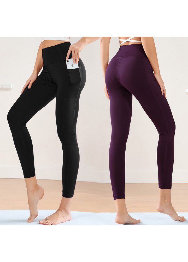 Cross border new style Pocket Yoga Pants women's European and American foreign trade women's tight sports pants high waist solid color fitness Capris
