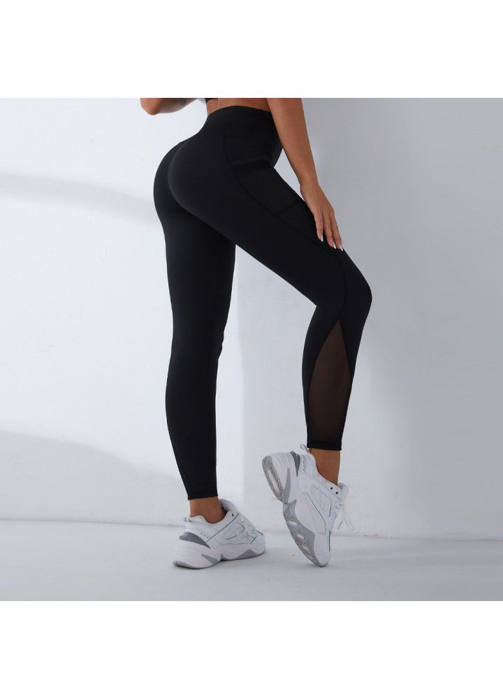 2021 European and American new yoga pants women's cross border slim high waist fitness pants running sports pants two side pocket Capris