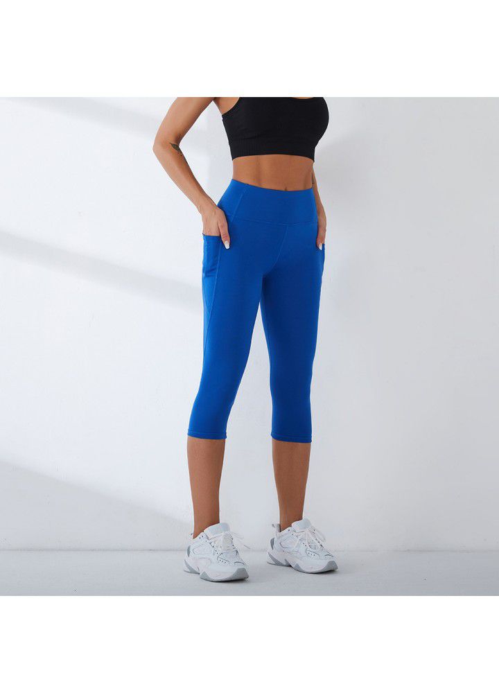 2021 European and American new yoga pants women's cross border slim high waist fitness pants running sports pants two side pocket Capris