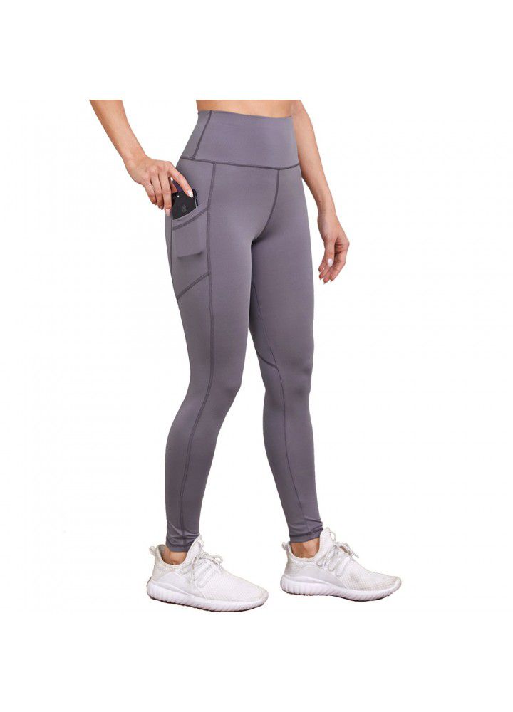 Cross border pocket sports tights women's European and American High Waist Stretch Yoga Pants running peach hip fitness pants women's nine cent
