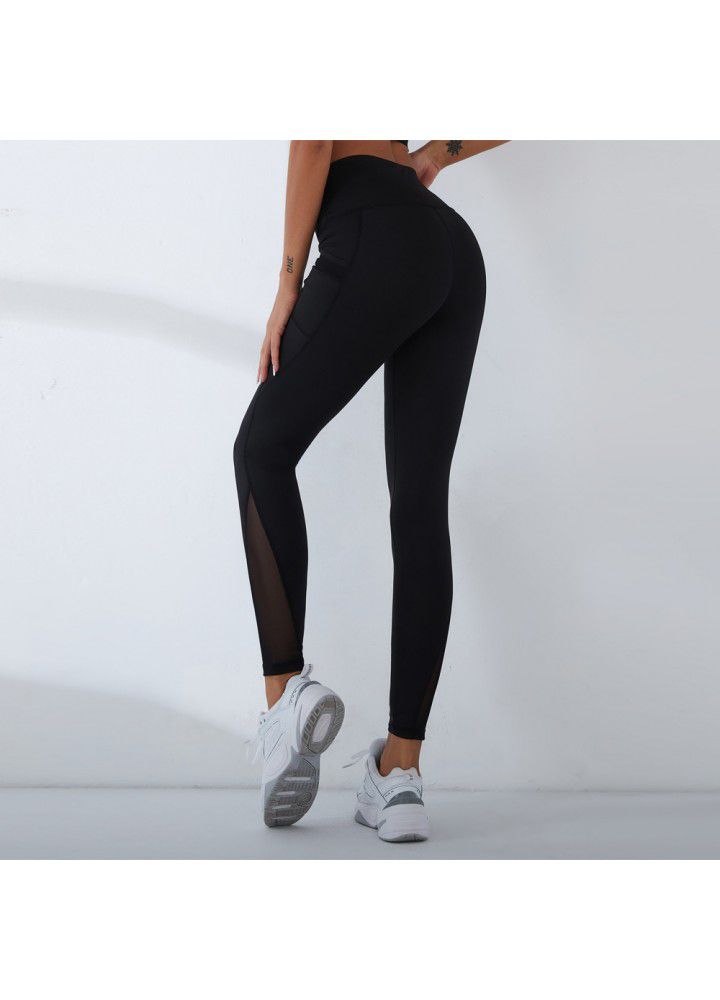2021 European and American new yoga pants women's cross border slim high waist fitness pants running sports pants two side pocket Capris