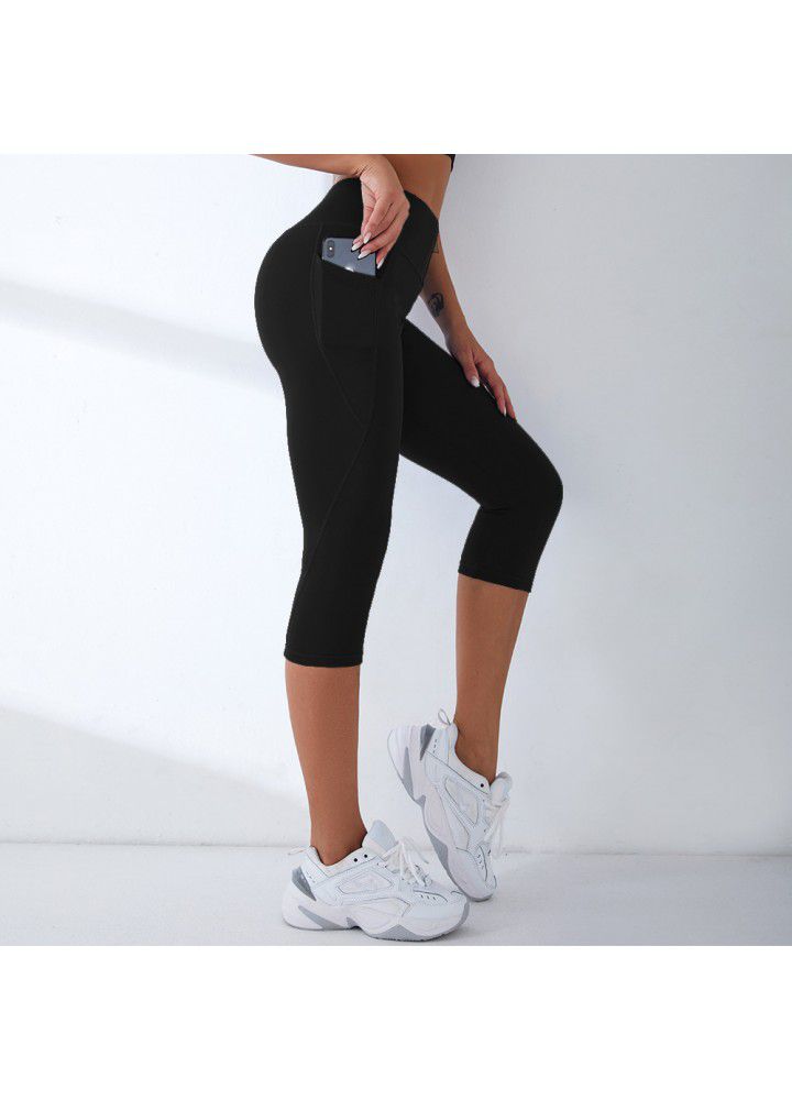 2021 European and American new yoga pants women's cross border slim high waist fitness pants running sports pants two side pocket Capris