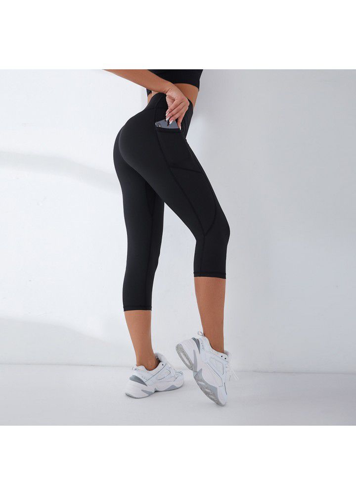 Cross border fitness pants quick sell Capris side pocket high waist hip sexy Leggings European and American Yoga Pants female