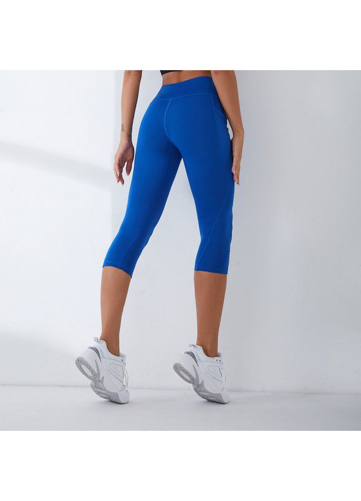 2021 European and American new yoga pants women's cross border slim high waist fitness pants running sports pants two side pocket Capris
