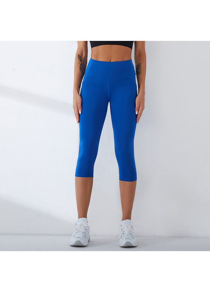2021 European and American new yoga pants women's cross border slim high waist fitness pants running sports pants two side pocket Capris