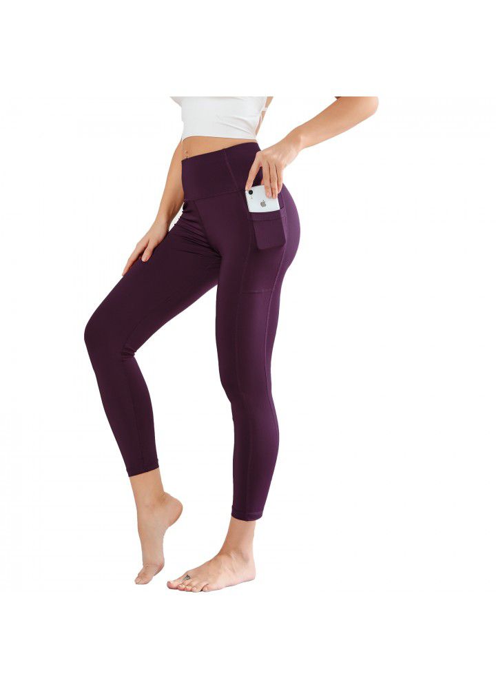 Cross border new style Pocket Yoga Pants women's European and American foreign trade women's tight sports pants high waist solid color fitness Capris