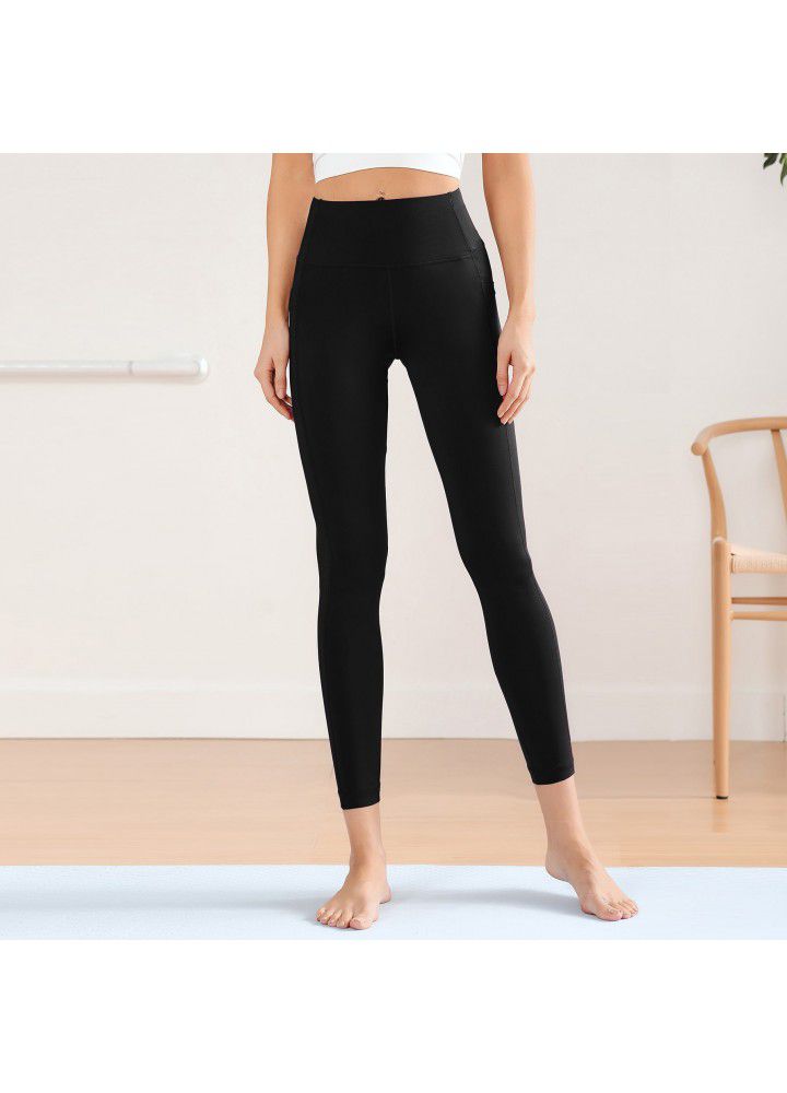 Cross border new style Pocket Yoga Pants women's European and American foreign trade women's tight sports pants high waist solid color fitness Capris