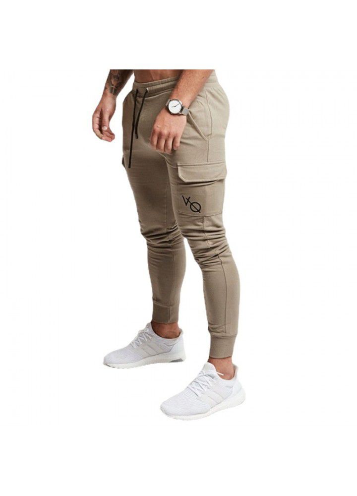 New muscle fitness brother spring and autumn pocket men's sports leisure exercise slim European and American pants