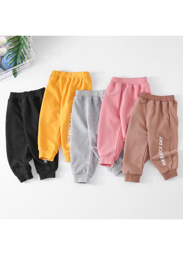 New children's spring and autumn sports pants solid color leisure sports pants Korean loose pants for boys and girls 